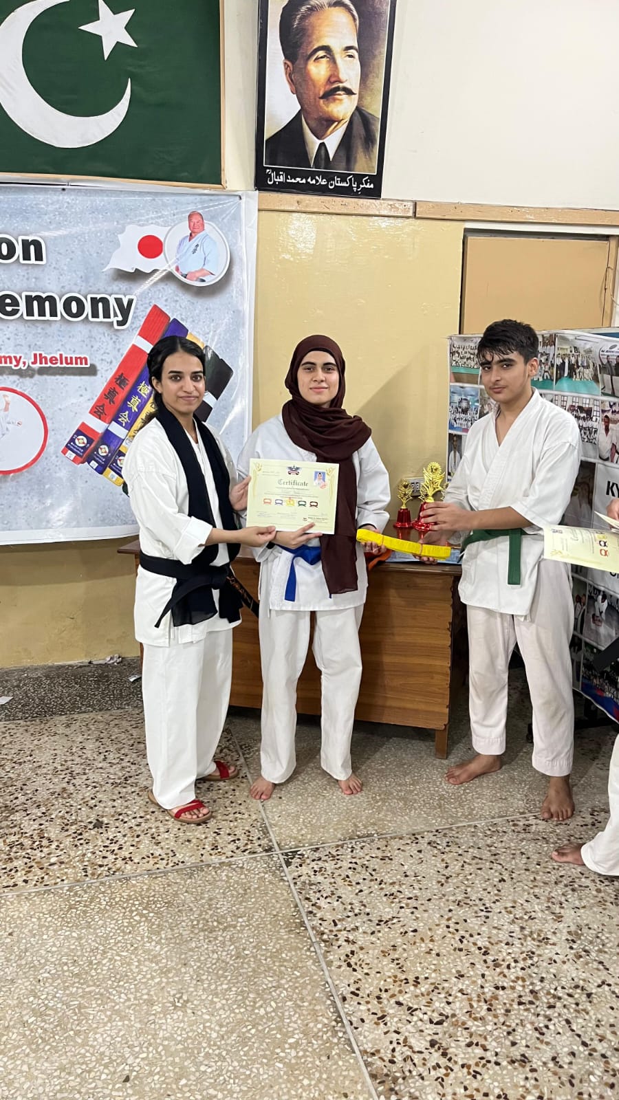 Student receiving belt